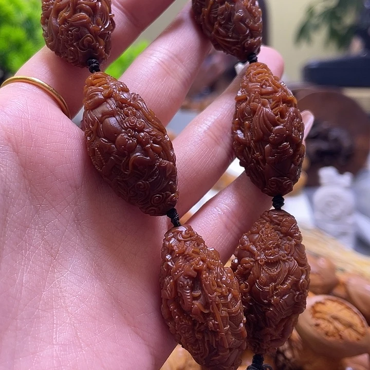 吉***意吊坠橄榄核橄榄核雕