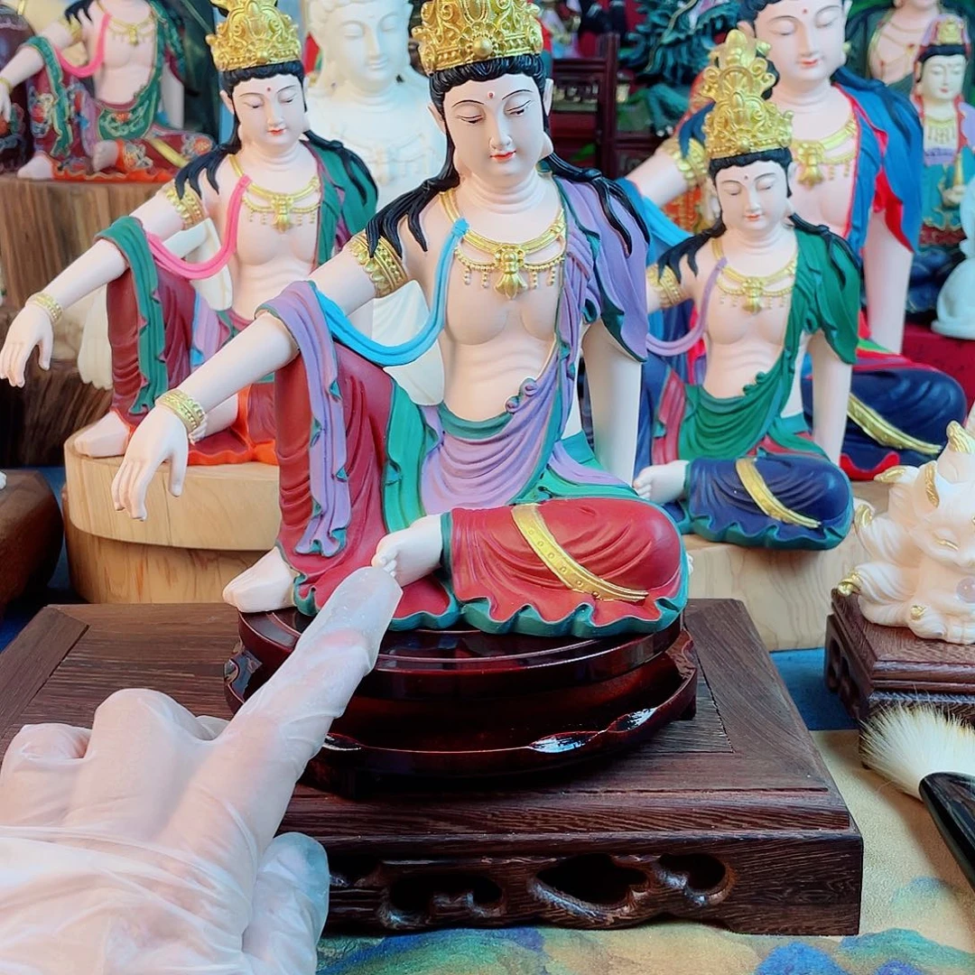 钧***钧石材自在观音摆件