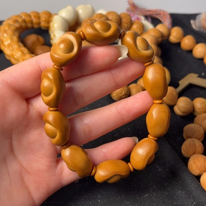 橄榄核吊坠聚宝盆