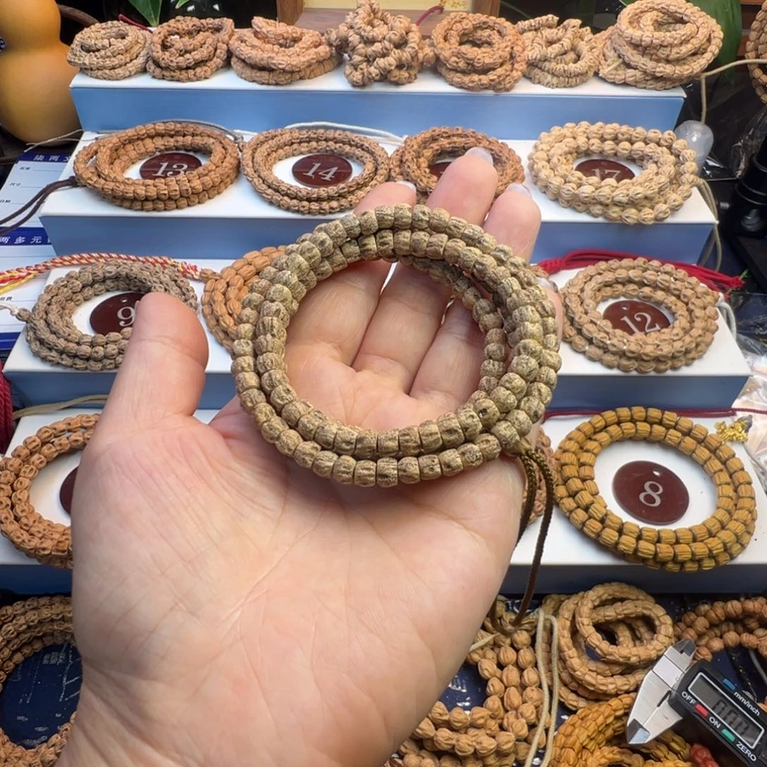 吕***布柏香籽/百香籽吊坠