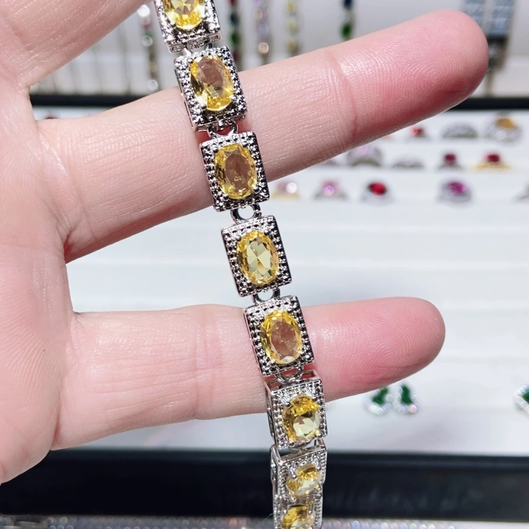 银S925镶嵌耳饰托帕石夕*