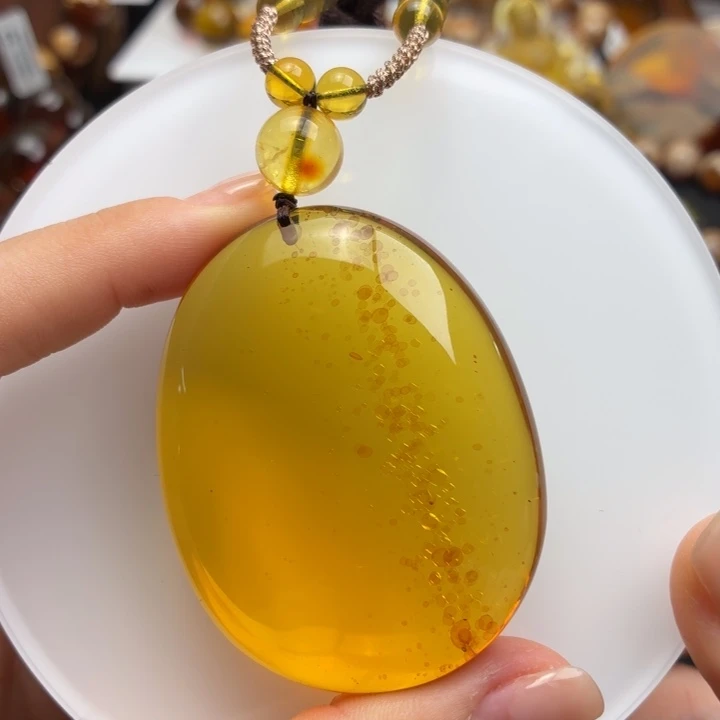 琥珀未镶嵌珠宝奇石黄绿茶雨花椭圆牌（27.82克