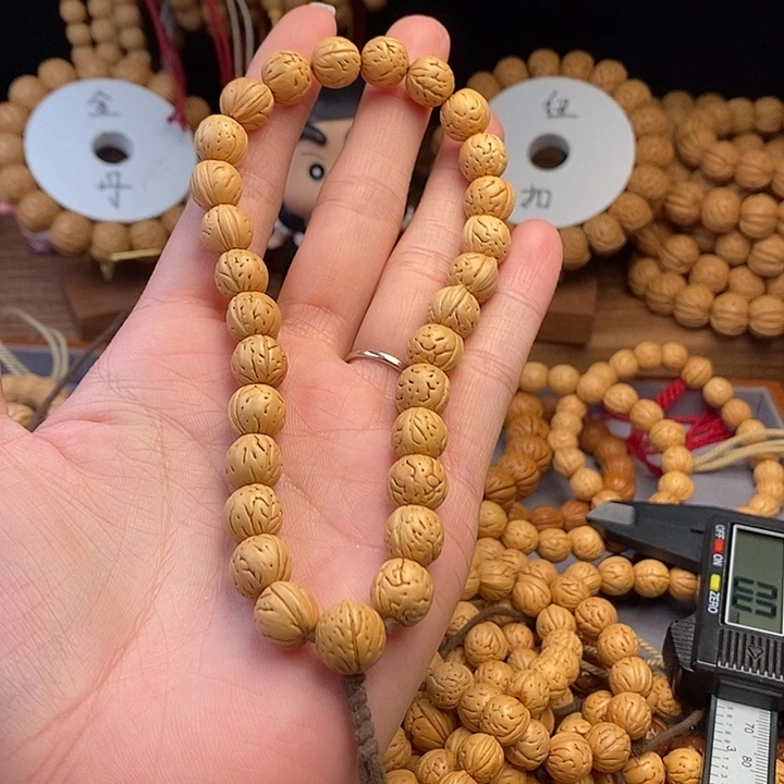 桃核手串斑*手持10.5 （尺寸误差0.5之间）