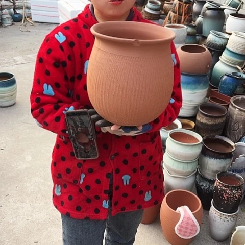 口23高25瑕疵盆子。