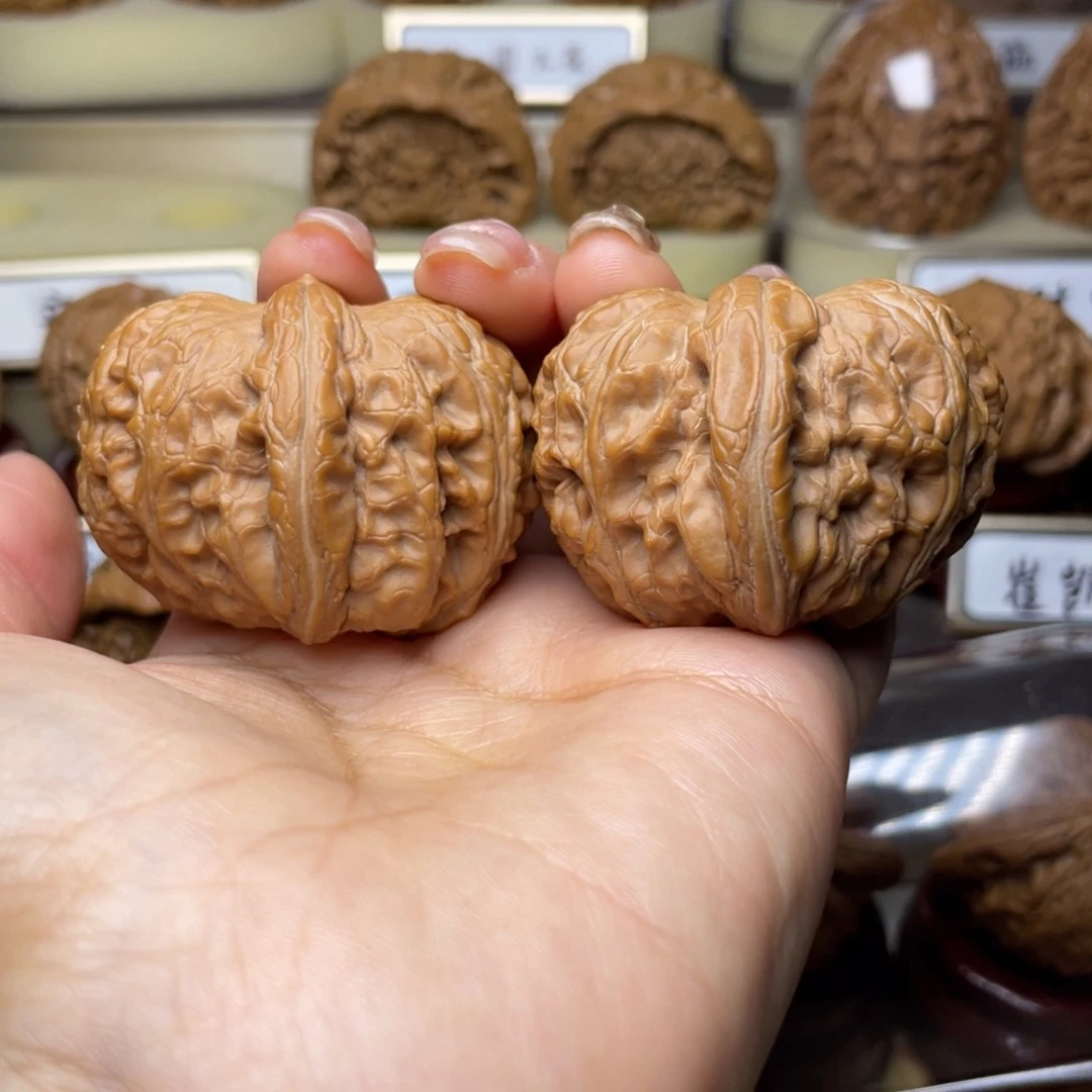 文玩核桃把件平**生元宝45左右