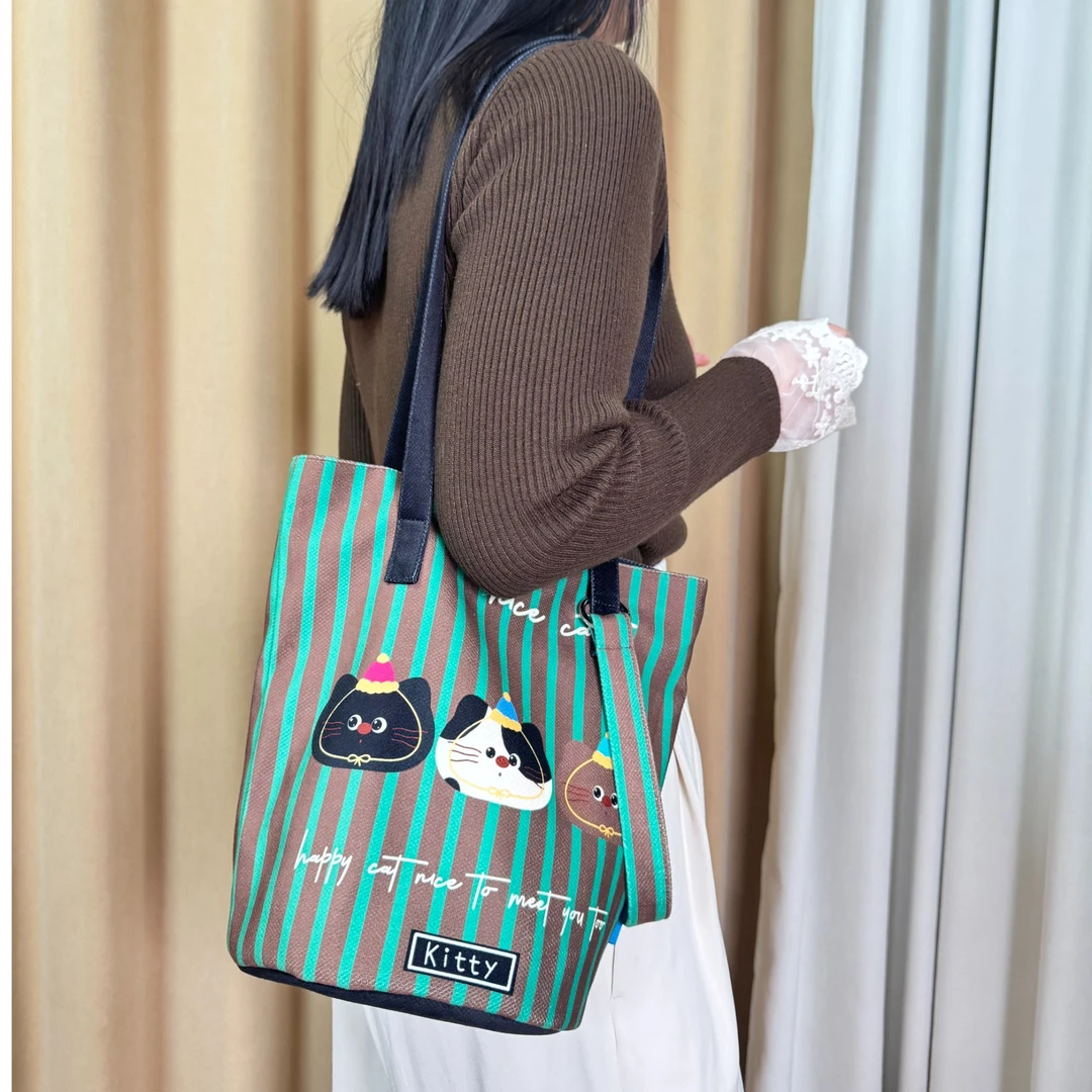 酷巴布秋冬新款三只小猫可爱水桶包时尚百搭简约单肩斜挎包女包