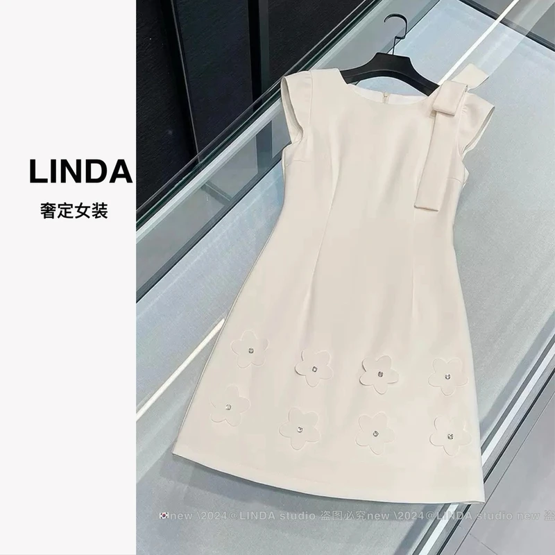 『奶油日记』南油高端女装夏季法式赫本风蝴蝶结无袖修身连衣裙女