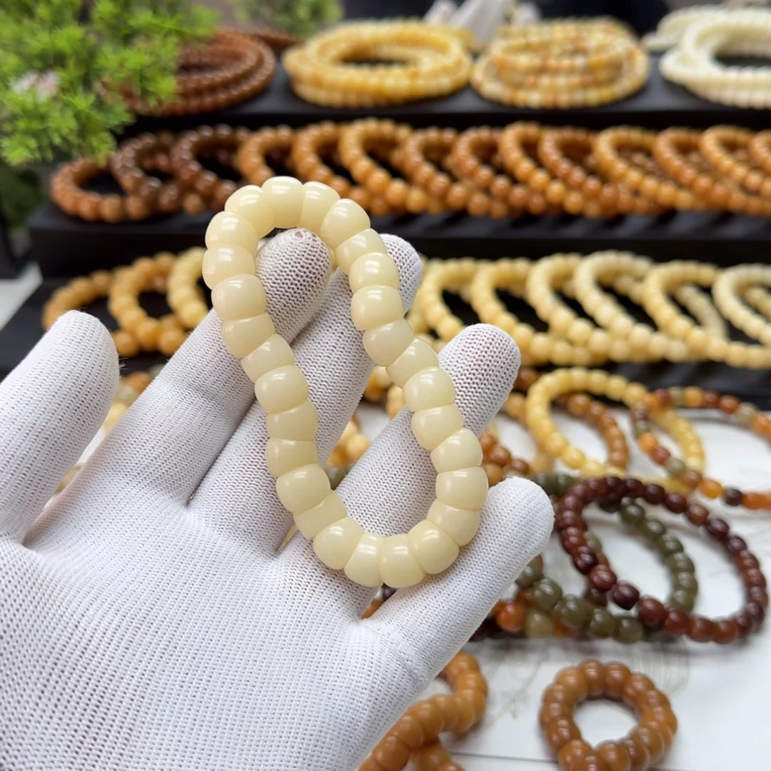 菩提根/象牙果手串11*12精工 5年