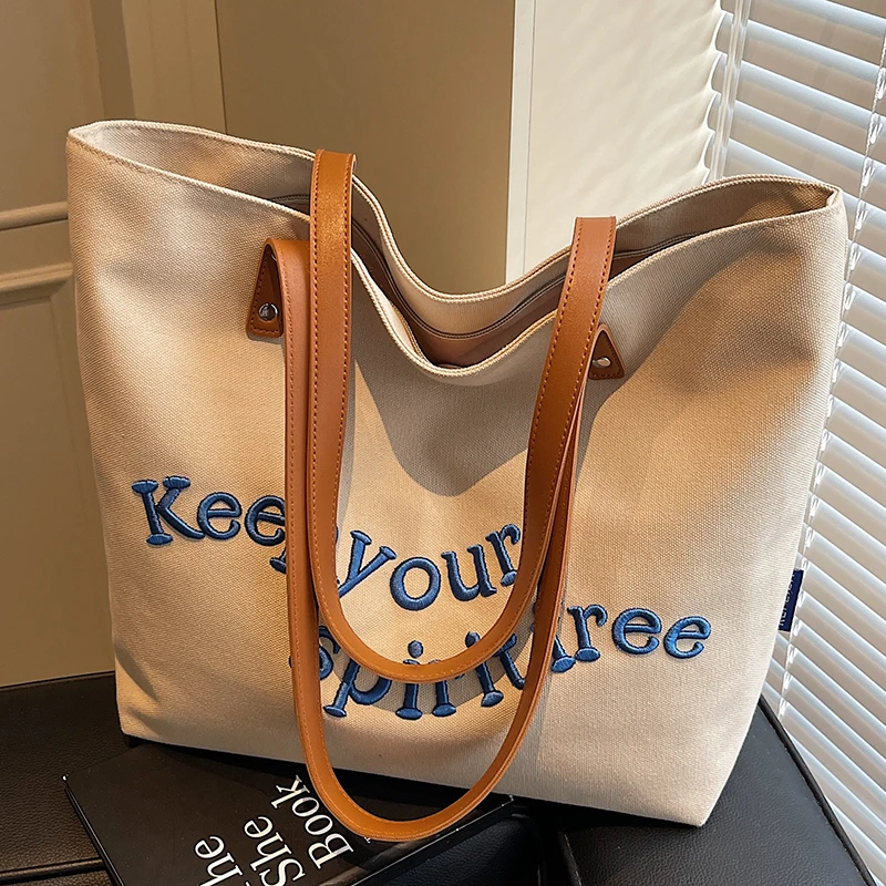 大容量包包女2025新款文艺百搭刺绣单肩包高级感大学生通勤托特包