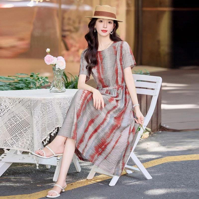 财阀千金2025夏季新款女装圆领套头系带腰显瘦连衣裙文艺印花长