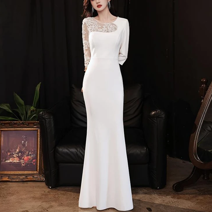 高级感白色鱼尾晚礼服女2025新款重工轻奢小众高端宴会主持人气质