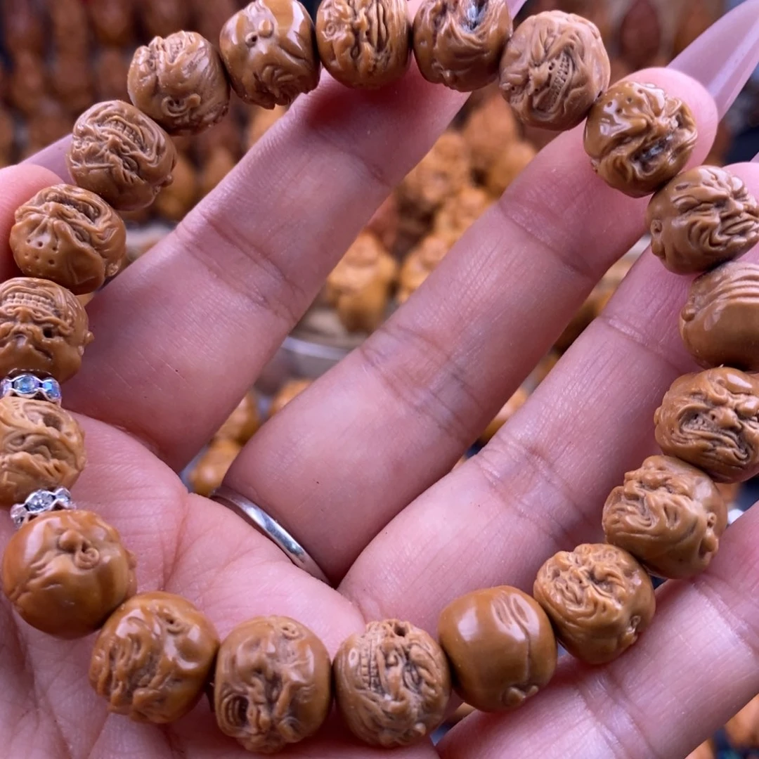 橄榄核吊坠猴头手串两单包邮有瑕疵