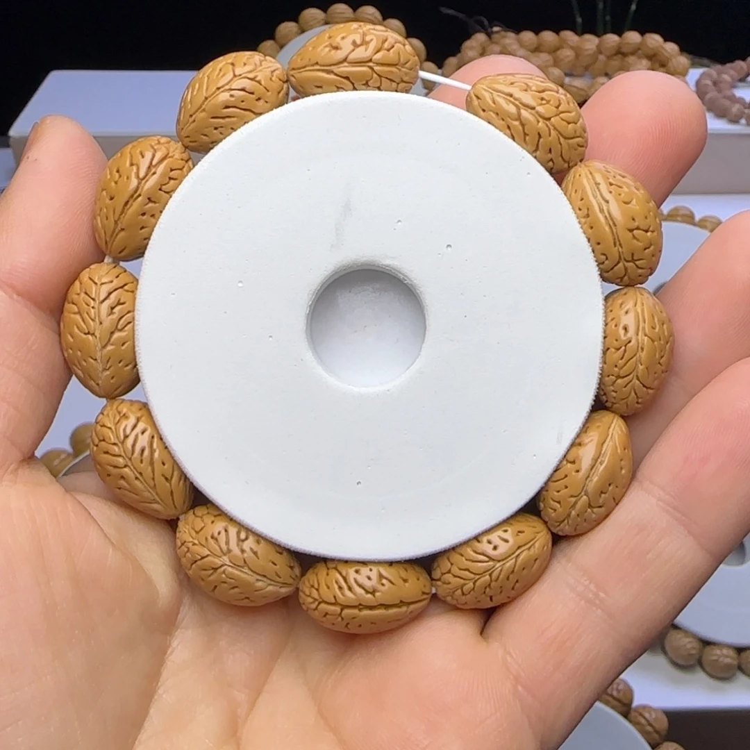 我***a手串桃核麦穗钱袋子