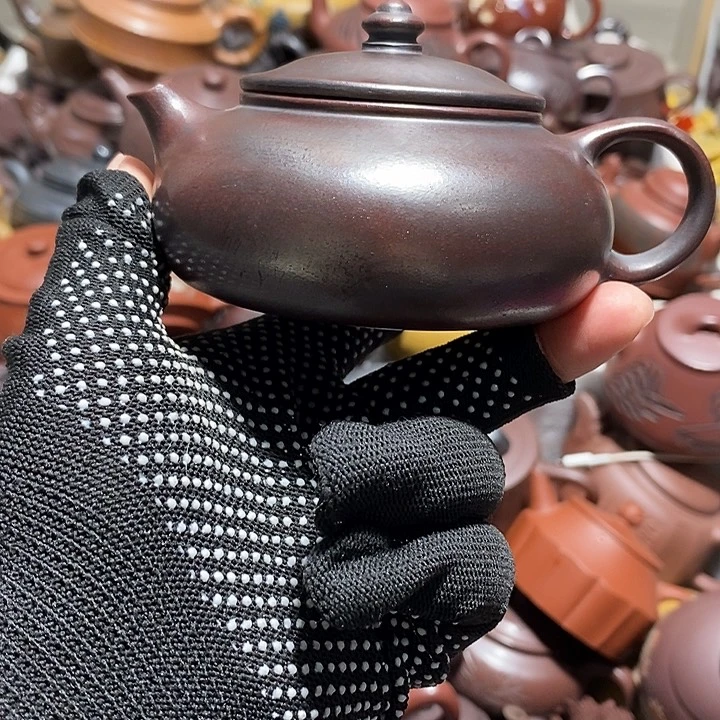 紫砂茶壶划痕微笑