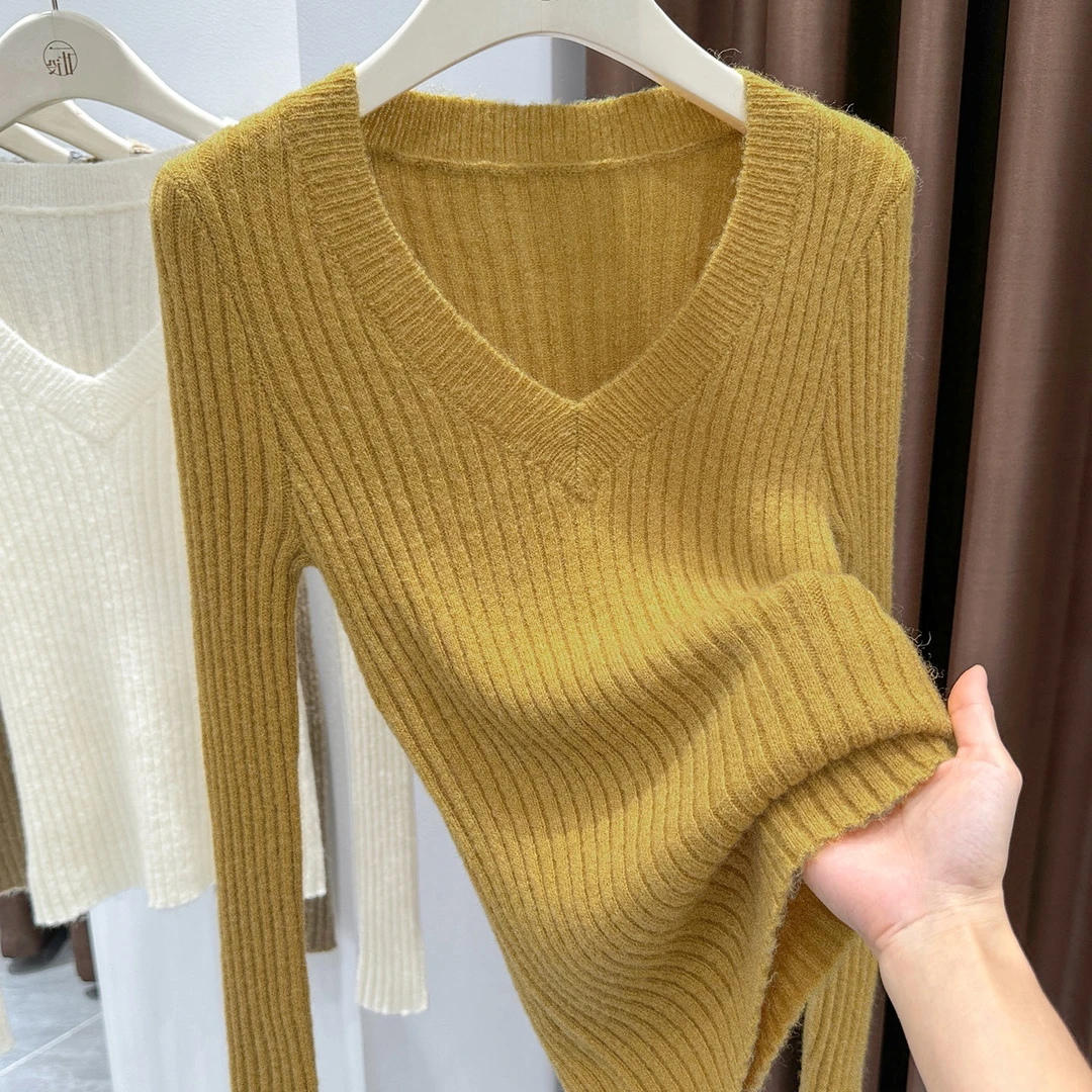 酷飒高品质姜黄色女士长袖针织V领上衣2025冬季清冷松弛感打底衫