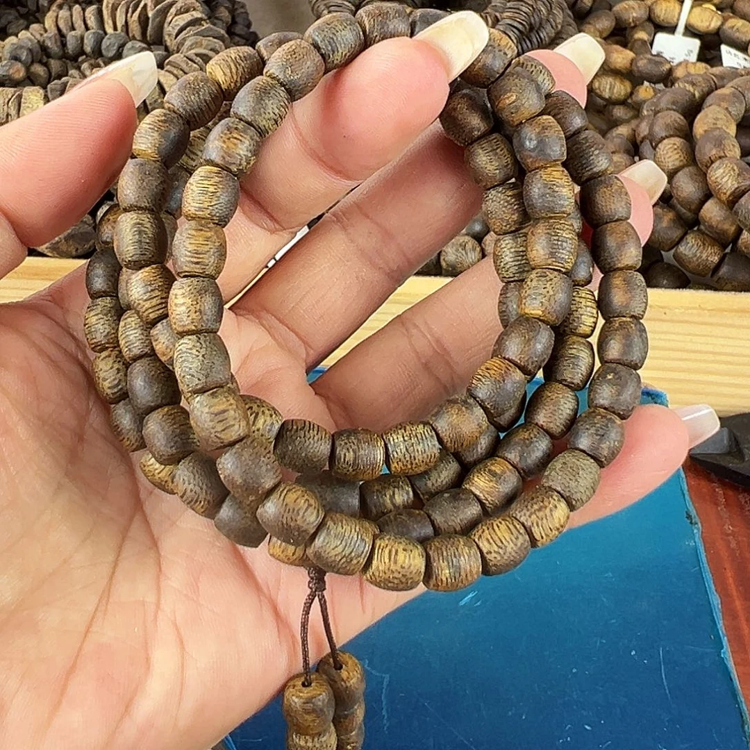 海***笑沉香沉香碎屑卡7蓝宝石鼓珠多圈26g