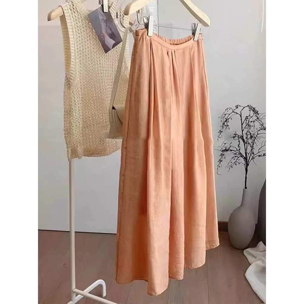 被惊艳到了！巨漂亮！橘粉色半身裙女夏季2025时尚垂感a字伞裙长裙