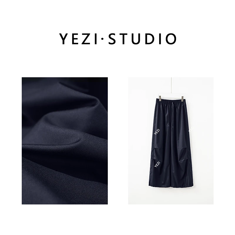 【都市探险家】三片式立裁率性藏肉松紧腰微阔羊毛降落伞裤25336017