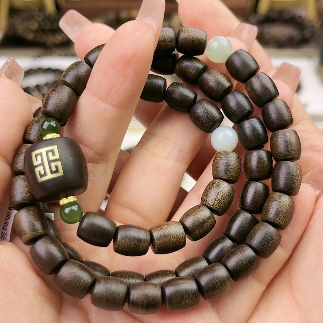 手串沉香聚****源紫棋玉化碳化老料桶珠
