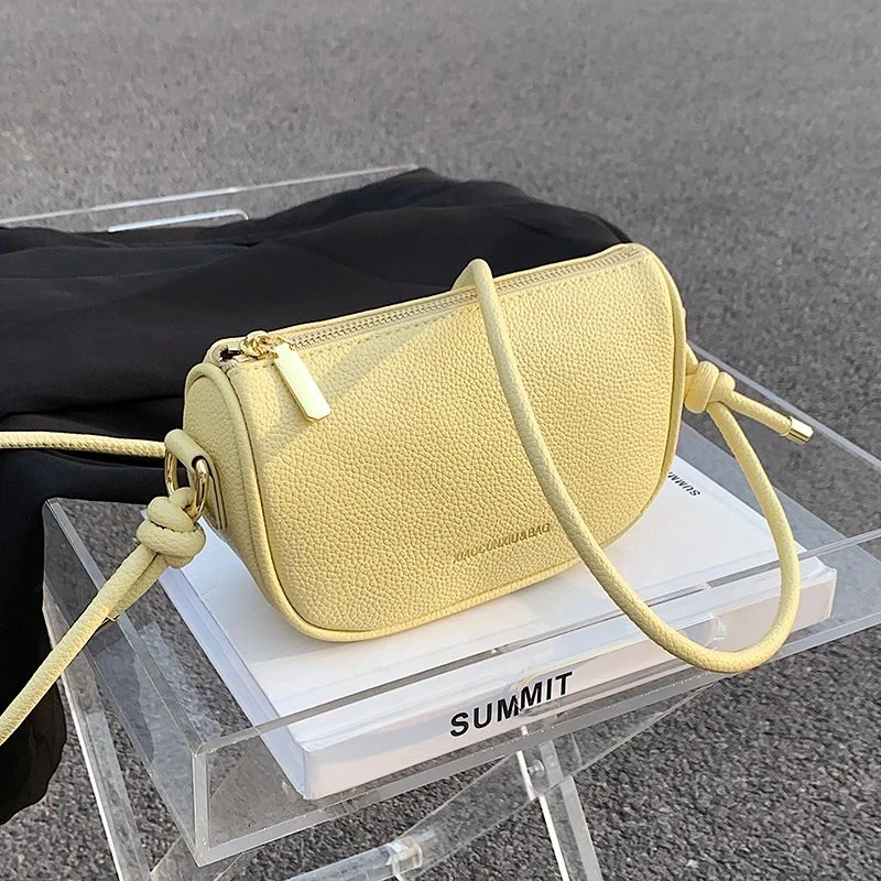 奶黄色包包女2024夏天新款时尚韩版单肩斜挎包休闲百搭半圆马鞍包