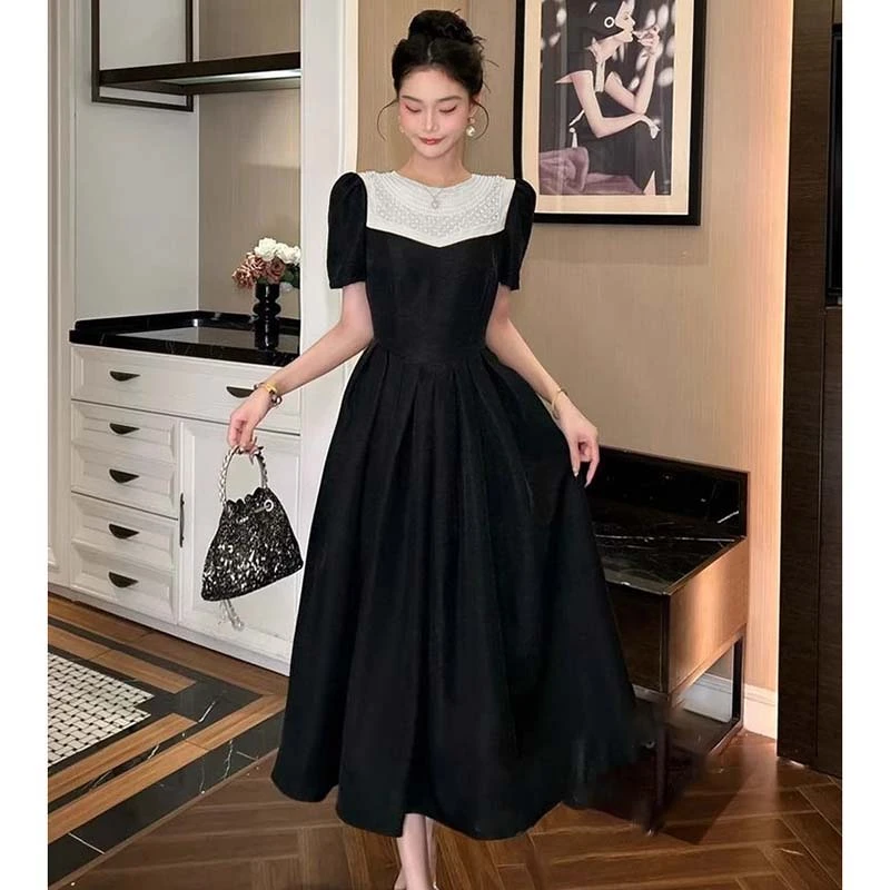 时尚气质连衣裙女夏季新款赫本风黑色高级感收腰显瘦大摆裙D1285