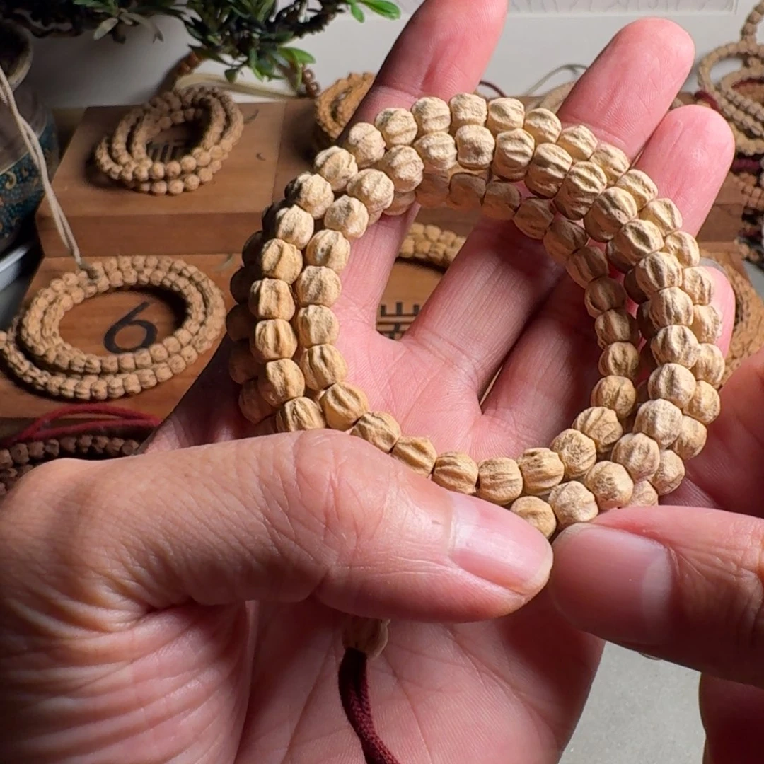 天***齿柏香籽/百香籽手串7毫米金钻