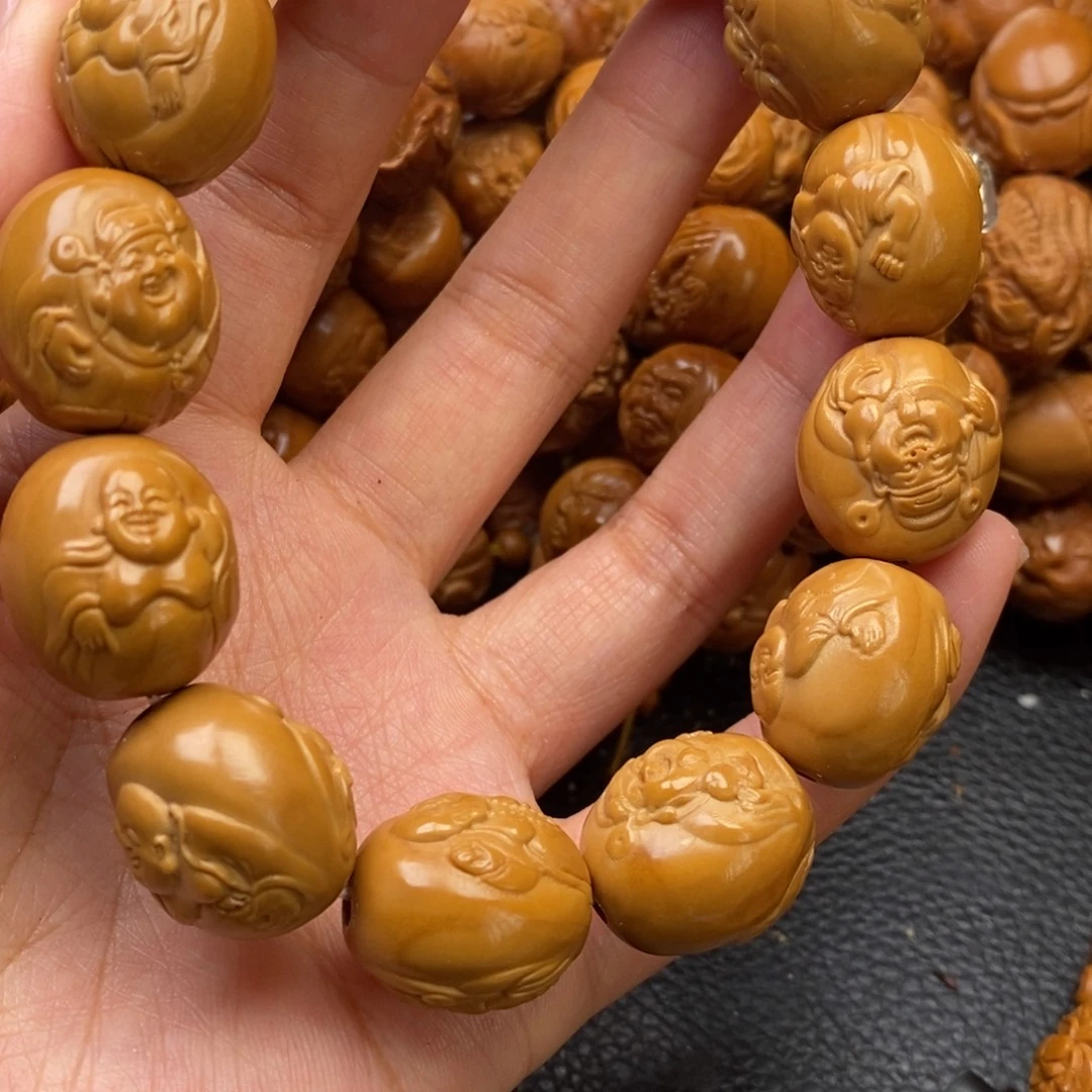 用***飞橄榄核吊坠双面财迷特价