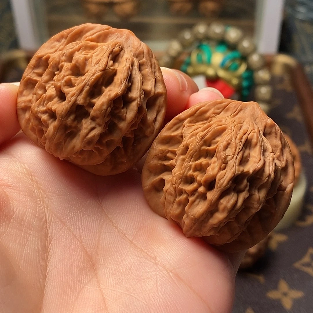 桃核把件麦虎38尺。