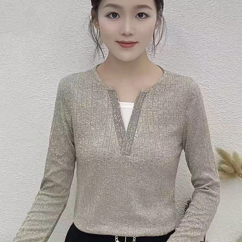 2025秋季新款设计感假两件烫钻领口女小众别致漂亮V领上衣25151