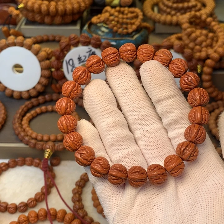 T***g手串桃核秦岭龙纹