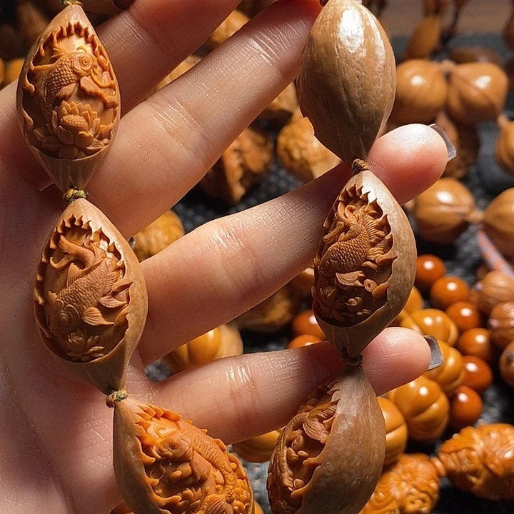 吊坠橄榄核包衣金鱼