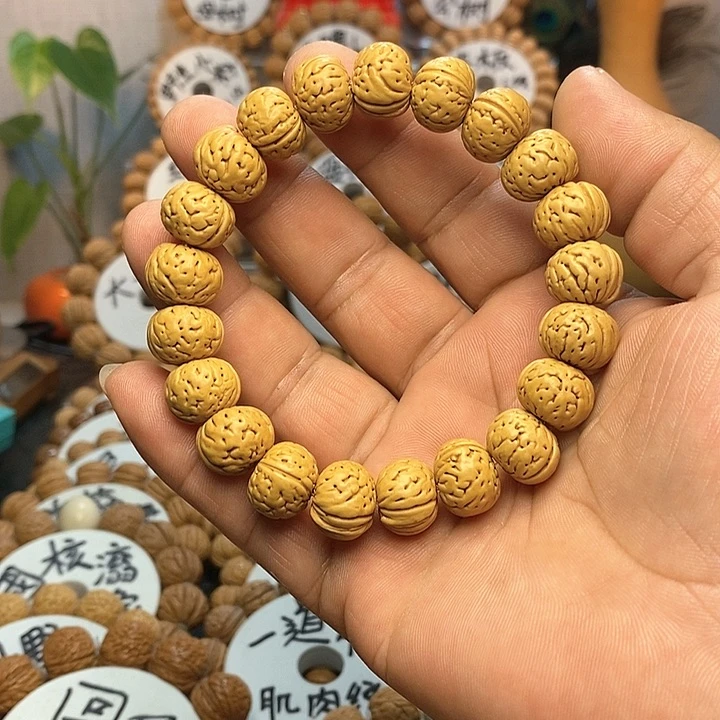 【闪购商品】0****9桃核纽扣手串手链