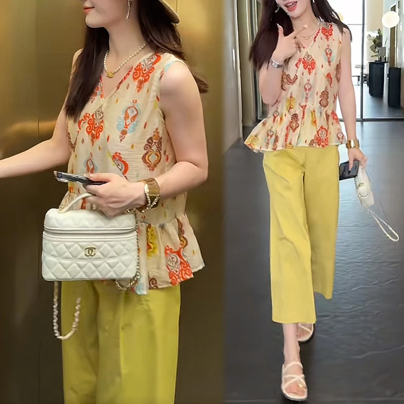 法式气质黄色碎花无袖衬衫上衣女2025夏季新款设计感小众印花上衣