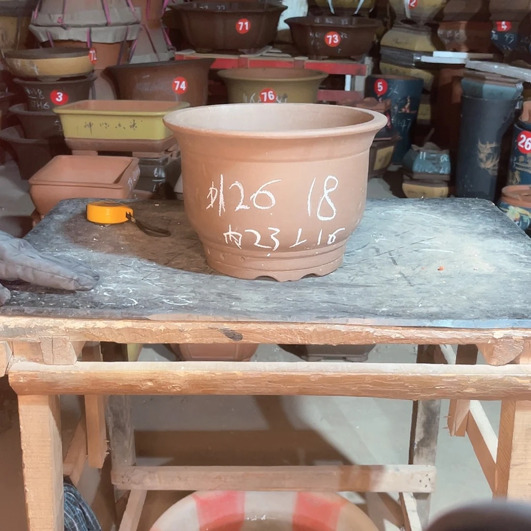 紫砂花盆金钟一个