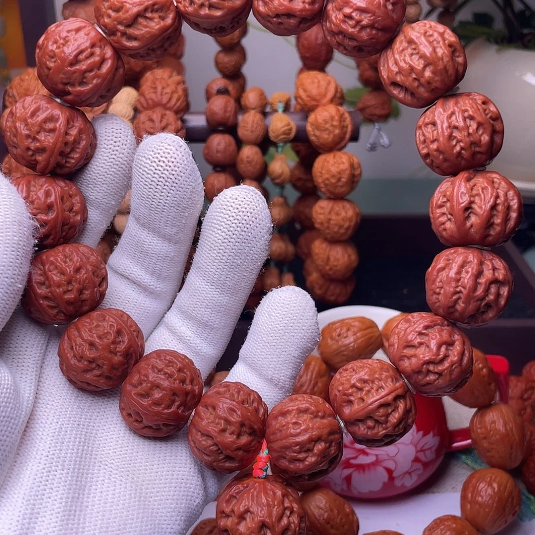 ****销文玩核桃吊坠秋子