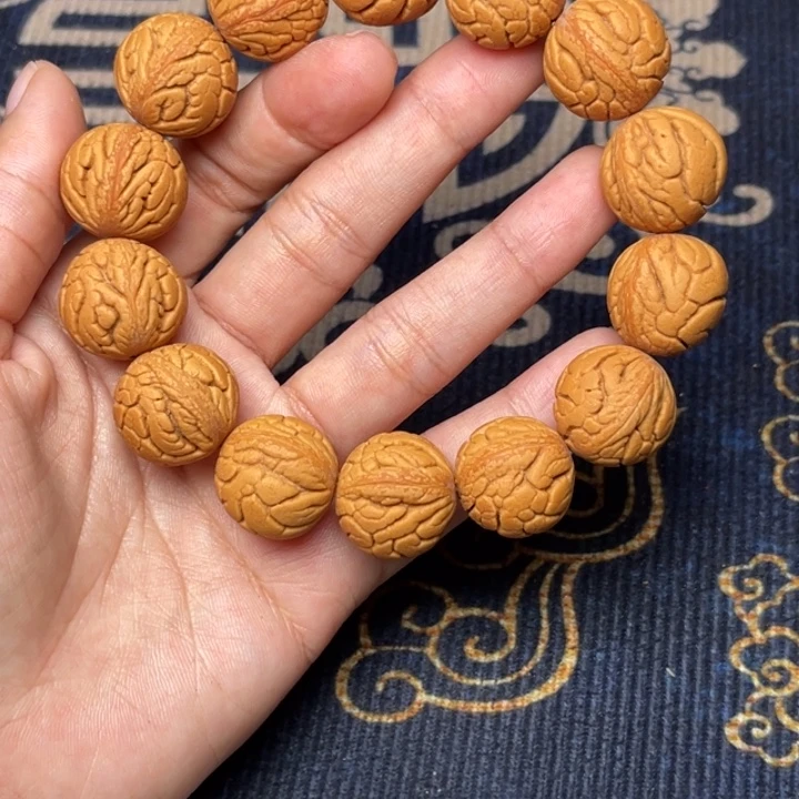 桃核手串金丝龙珠18