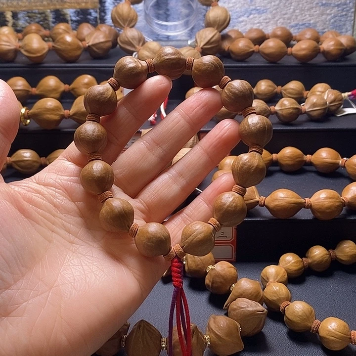 嘻***哈手串橄榄核蜜桃臀16×18