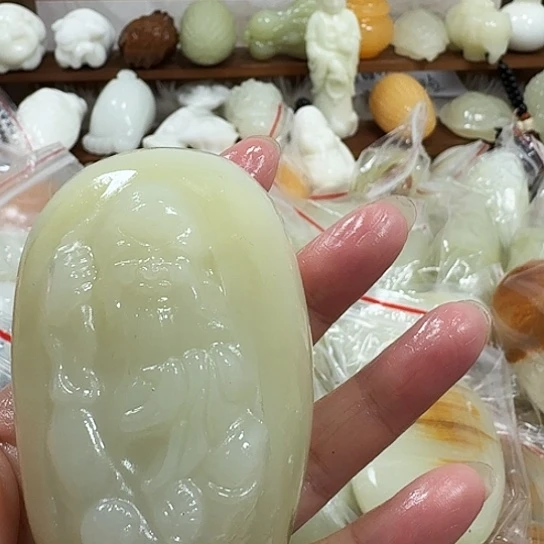 伟***华砖雕石头手把件不退不换