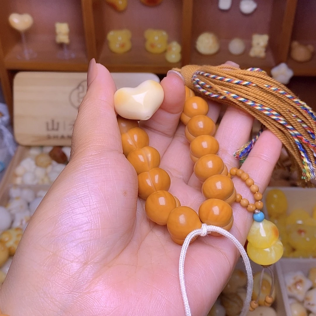 圆***.猴头核桃吊坠16柯基爱心葫芦提溜棕流苏