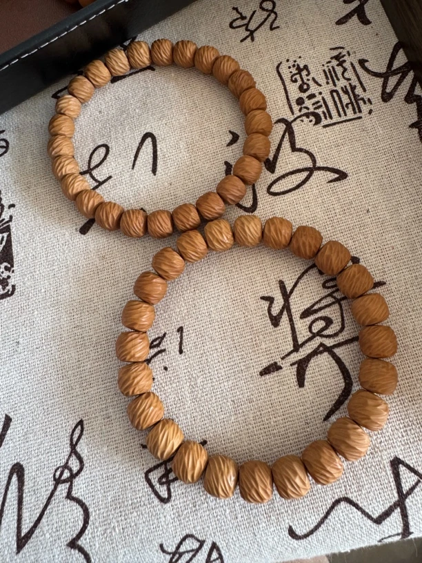 猴头核桃雕刻印金麟无相手串精品男女单圈文玩战斗瑕8+9+