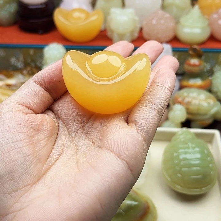 淡***伤石材元宝手把摆件