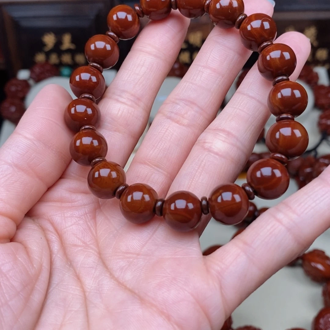 橄榄核吊坠毅光珠，