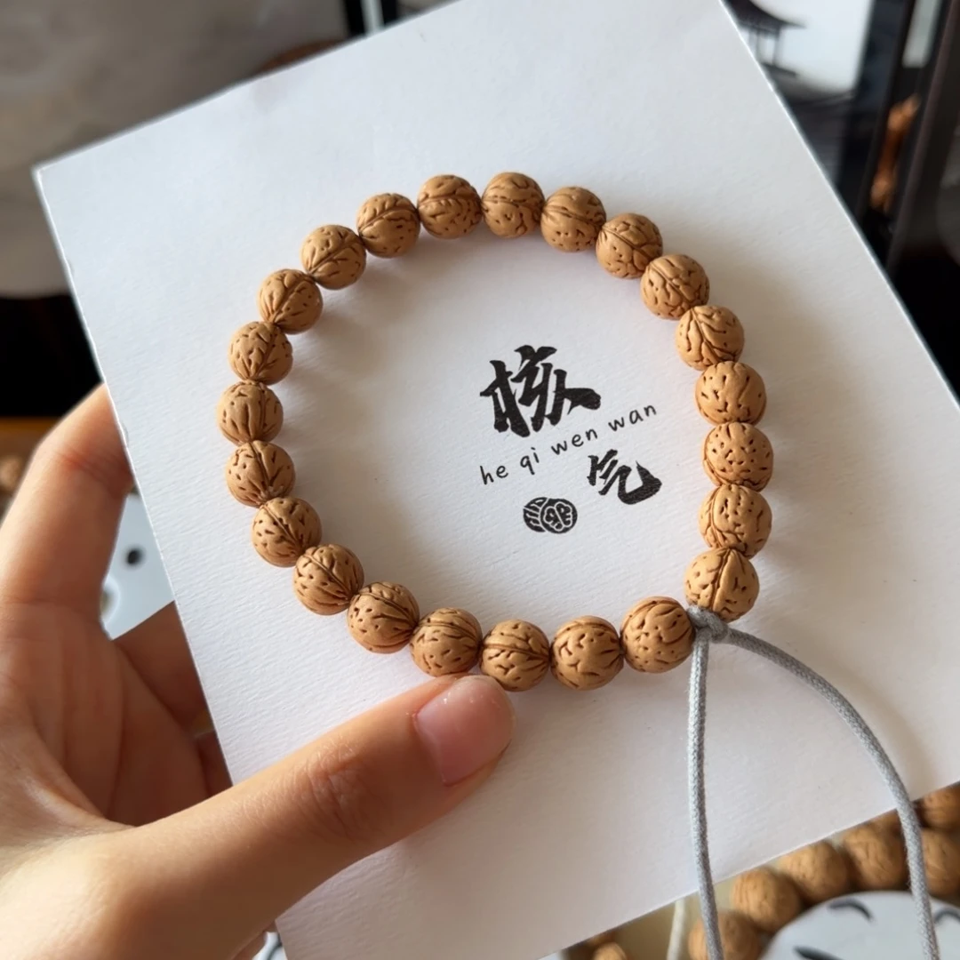 叁***月10小金豆子桃核吊坠