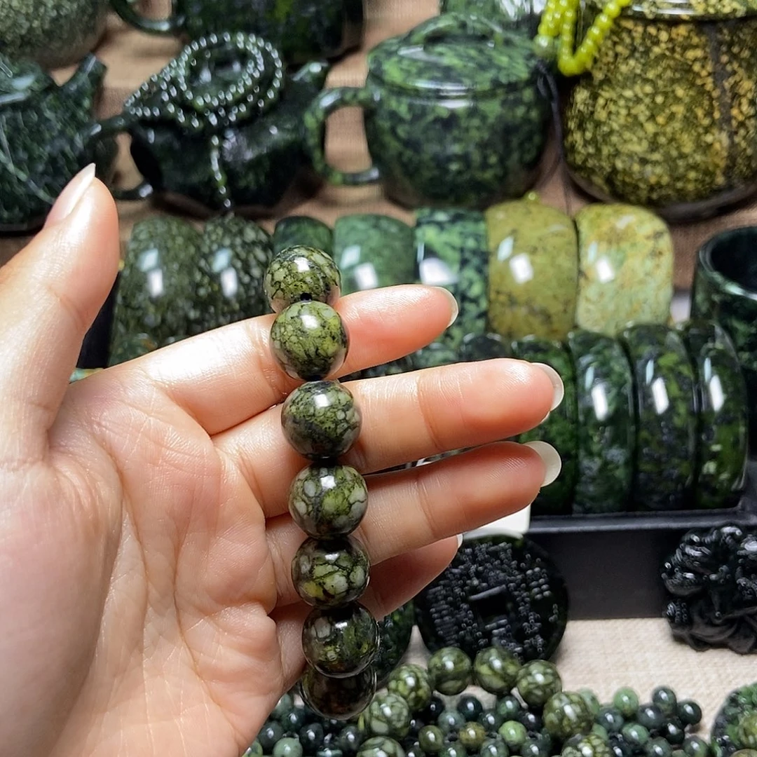 闲***鱼蛇纹石玉未镶嵌药王石