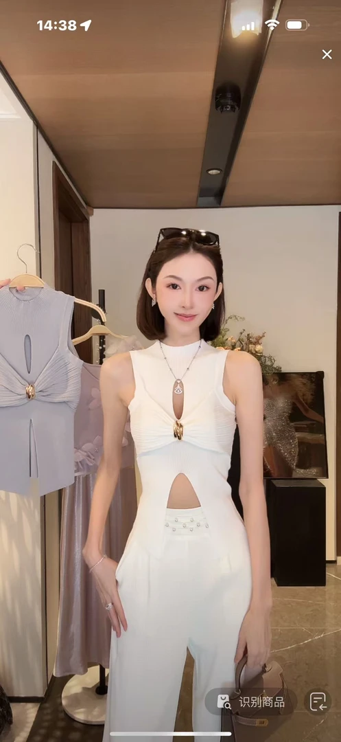 TUZI【缪斯女神】纯欲镂空金属纽扣无袖夏季千金针织开叉背心TZ09