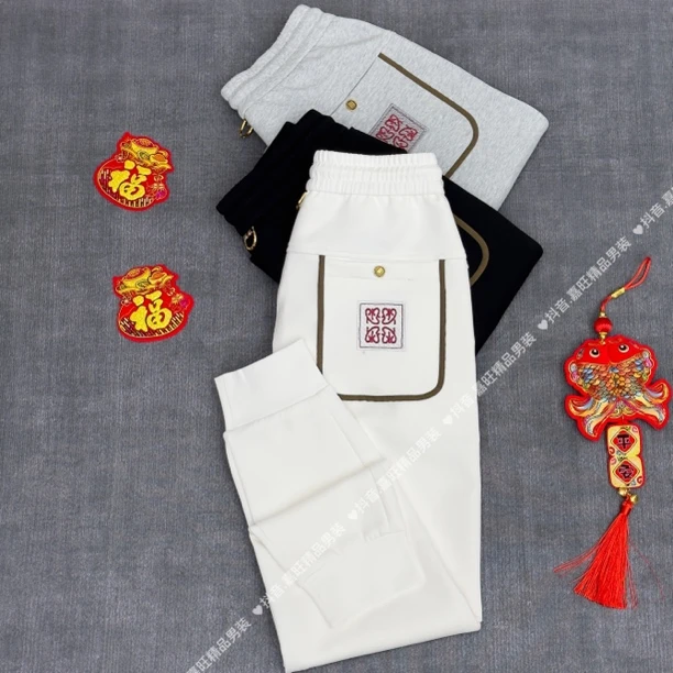 春季男士轻奢欧货时尚潮流百搭舒适空气棉休闲束脚织带卫裤