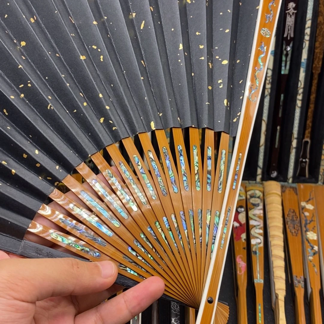 扇子《包边双龙庆寿三合青满嵌》