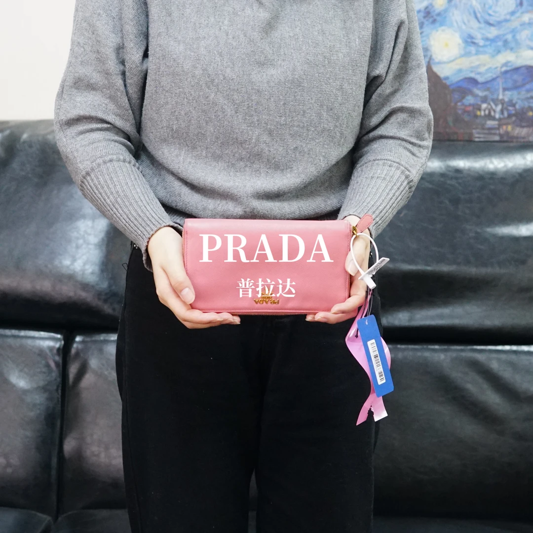 95新 Prada/普拉达 粉色手拿钱包/HD01317068/7068