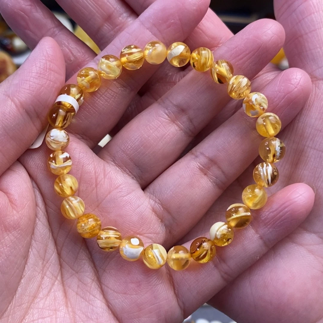 未镶嵌琥珀裸石杨***?金白拉丝纹手串7.2