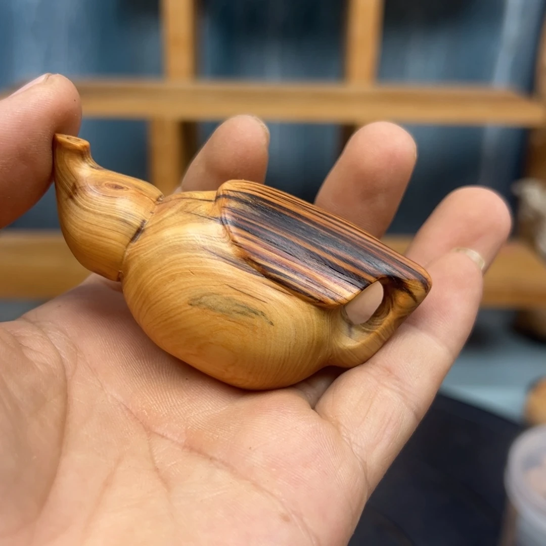 木A****爹崖柏木摆件手把件